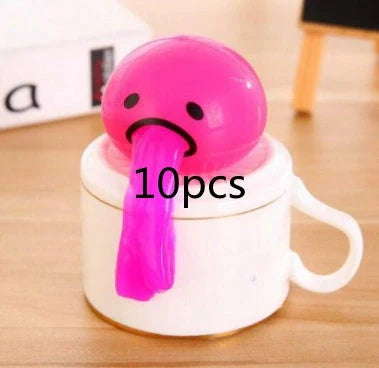 Gudetama Vomiting Egg Toy in green, orange, pink, and yellow