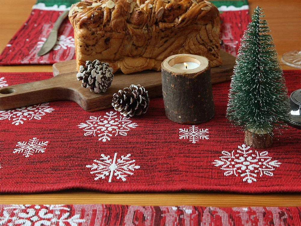 Christmas tablecloth with snowman and snowflake design in red