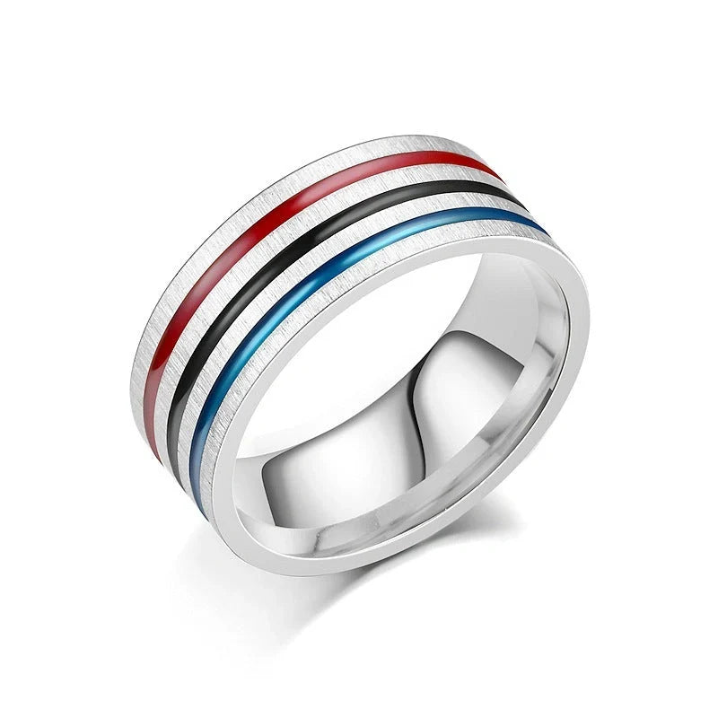 Iridescent titanium steel rings with rainbow-like oil treatment and sleek, flower-inspired design