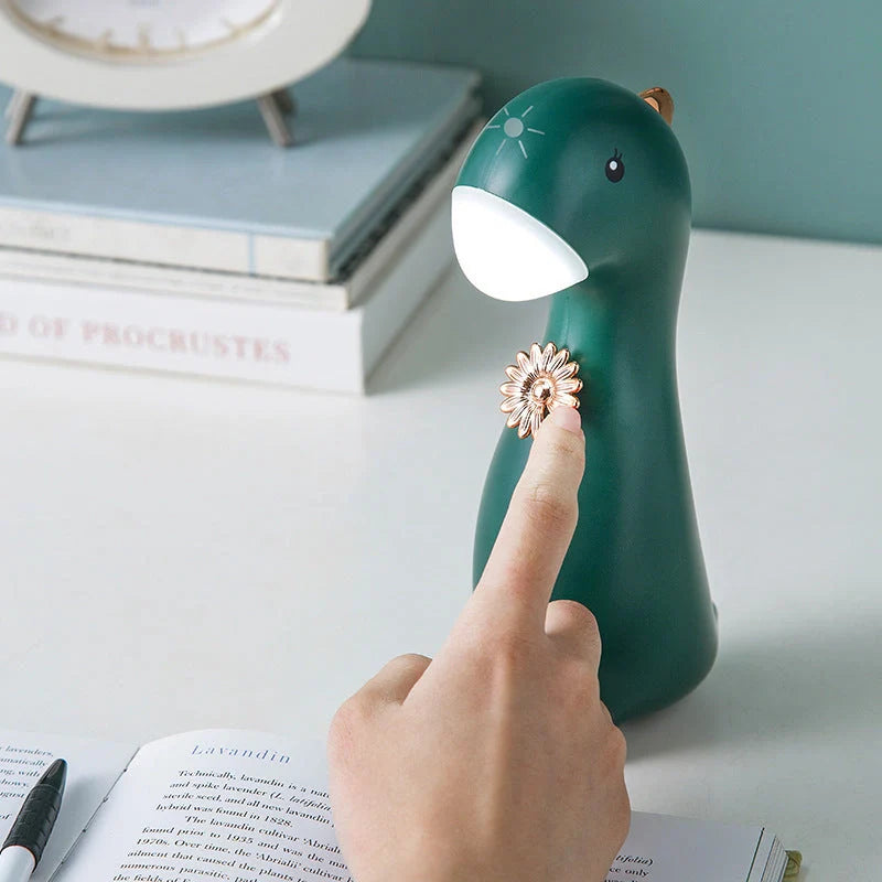 Adorable dinosaur LED night light with touch control in pink, blue, and green