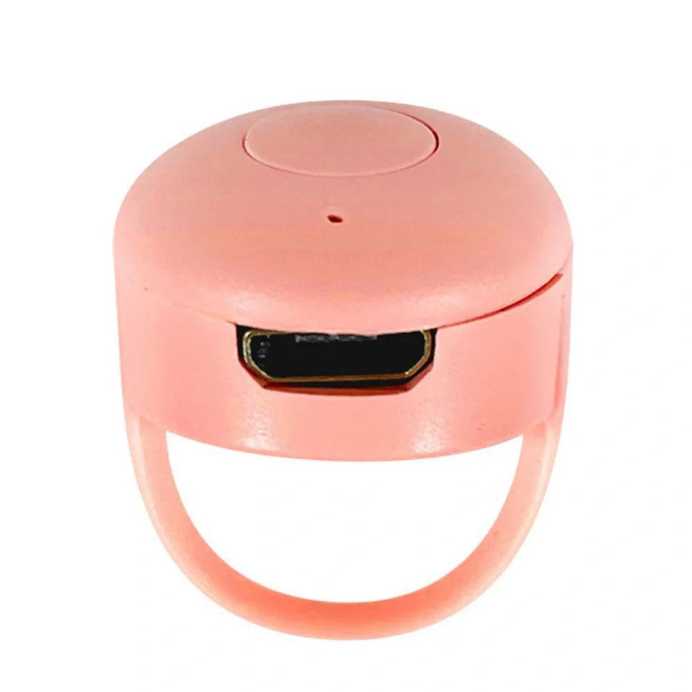 Bluetooth remote control ring for mobile phones in yellow, blue, or pink