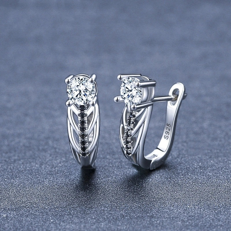 Elegant black hollow zircon copper plated earrings for women, perfect for any occasion.
