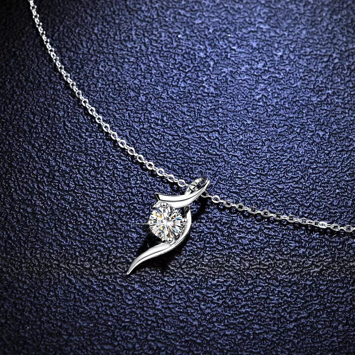 Elegant 925 sterling silver necklace with a sparkling moissanite diamond pendant, showcasing exceptional British craftsmanship.