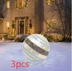 Vibrant inflatable Christmas baubles in a variety of colours and patterns, perfect for outdoor holiday decoration