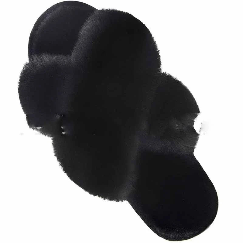 Cosy faux fur slippers in a variety of classic British colours, featuring a stylish cross-over design for indoor comfort and sophistication.