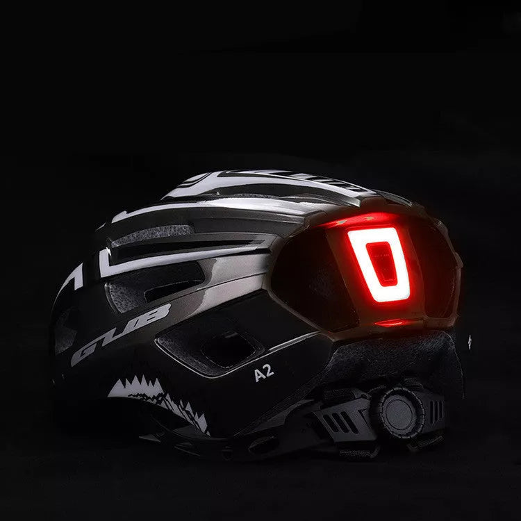 USB Charging Helmet with integrated taillight in bright colours for night cycling safety