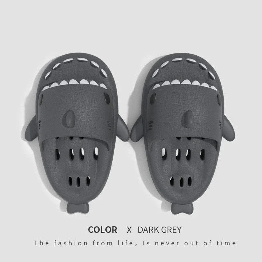 Fashionable shark-themed shower slides with drainage holes, featuring a realistic shark design, quick-drying EVA material, and non-slip traction.