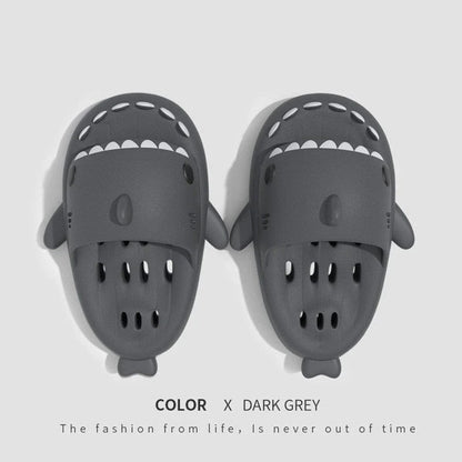 Fashionable shark-themed shower slides with drainage holes, featuring a realistic shark design, quick-drying EVA material, and non-slip traction.