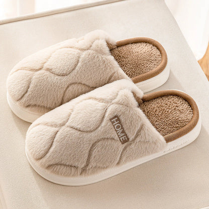 Plush slippers with soft, cushiony upper and durable PVC sole for cozy indoor comfort and traction