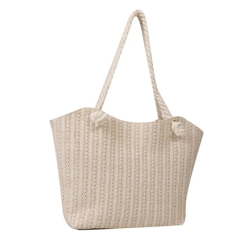 Stylish women's straw shoulder tote bag with large capacity, perfect for summer and everyday use.