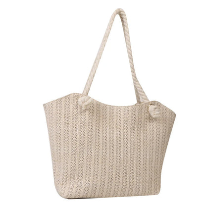 Stylish women's straw shoulder tote bag with large capacity, perfect for summer and everyday use.