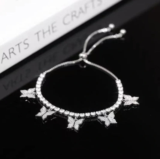 Adjustable Multi Butterfly Bracelet with zircon stones on a heart-shaped copper band