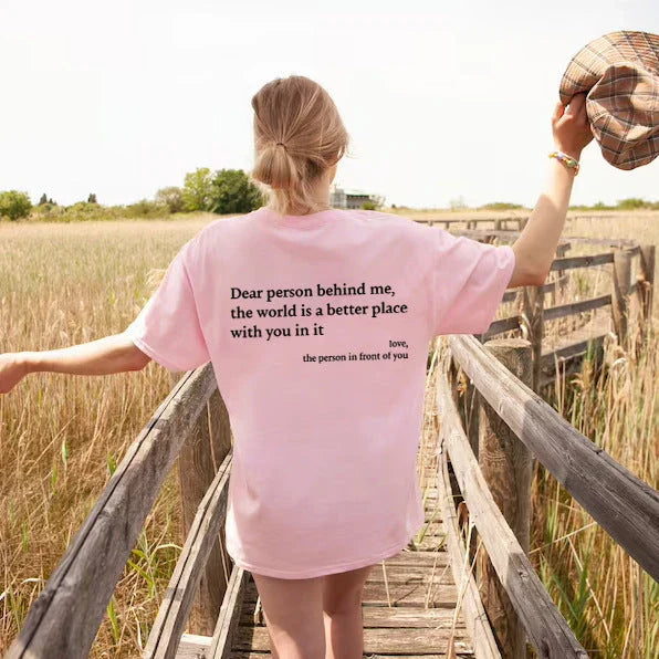 Women's graphic tee with playful slogan, available in various colors and sizes