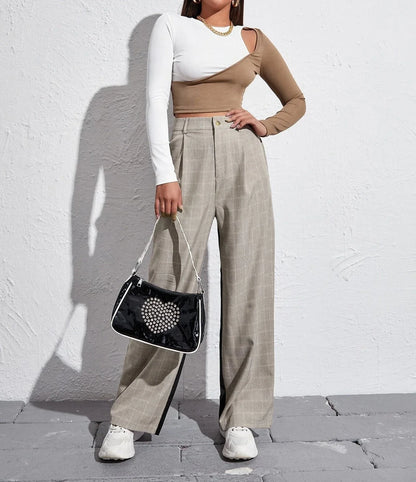 Stylish strapless cropped t-shirt in a trendy colorblock design, perfect for elevating any casual outfit.