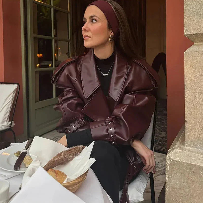 Stylish cropped leather jacket with loose lapel design, available in multiple trendy color options for fashionable streetwear