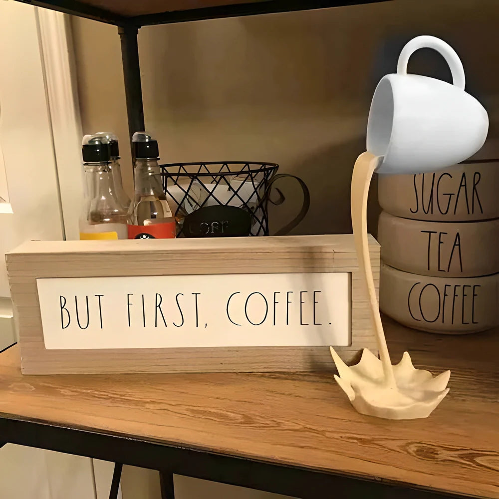 Elegant floating coffee cup art sculpture with a unique and mesmerising design, crafted from high-quality resin for a sophisticated decorative accent.