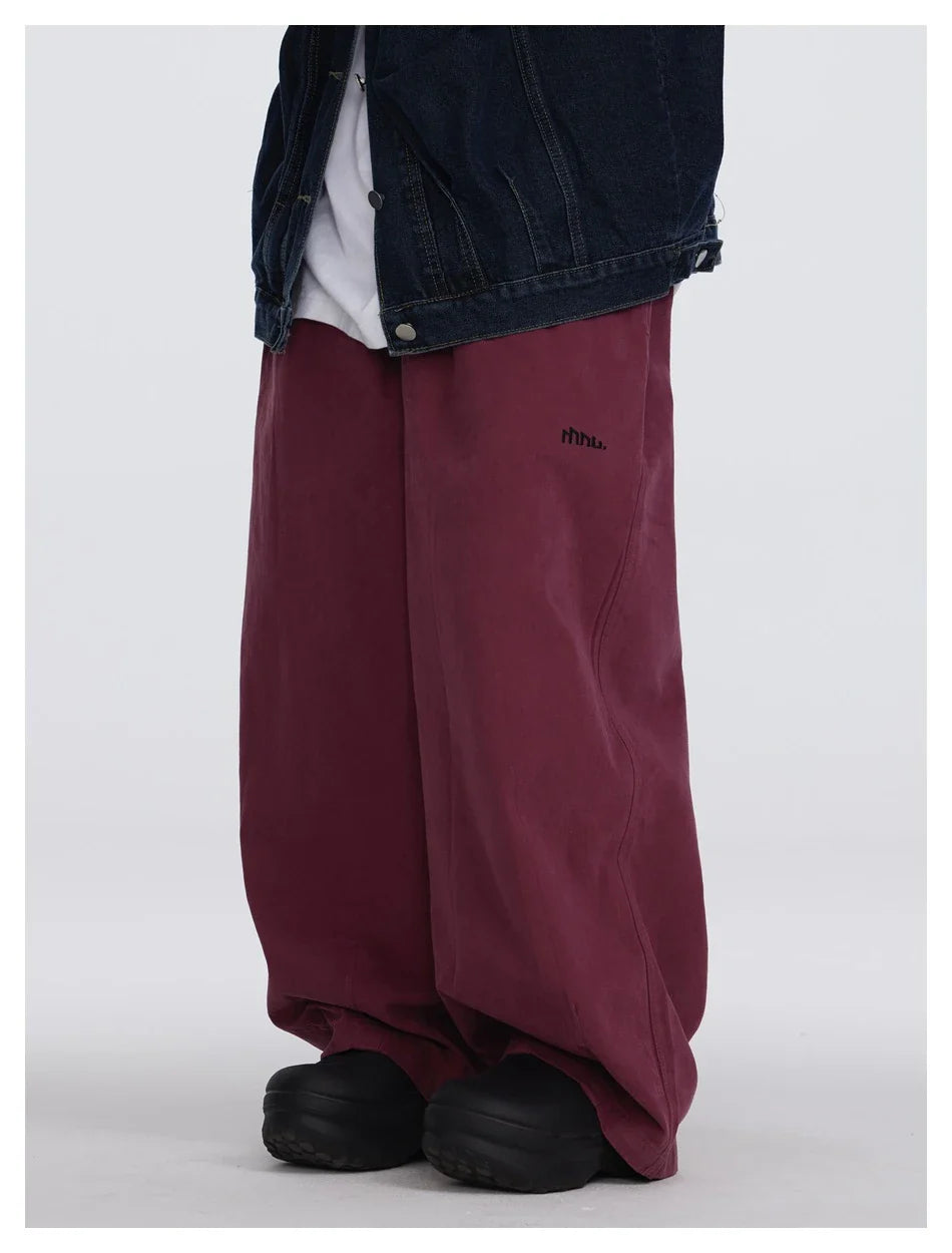 Sophisticated men's casual trousers in various colours, featuring a tailored straight-leg design and mid-rise waistline for a polished, British-inspired look.