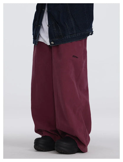 Sophisticated men's casual trousers in various colours, featuring a tailored straight-leg design and mid-rise waistline for a polished, British-inspired look.