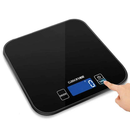 Compact white electronic kitchen scales with digital display for precise meal preparation