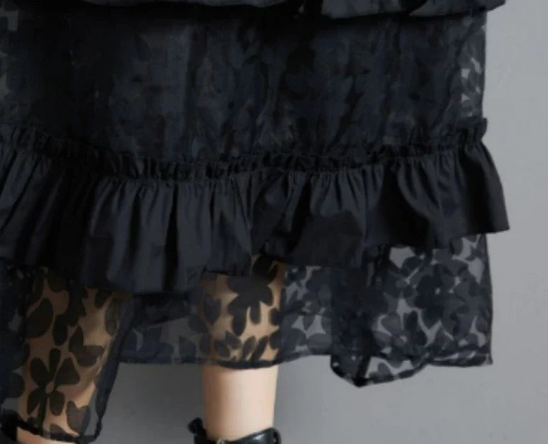 Plus size black lace dress with long sleeves and a loose, relaxed fit for a timeless and sophisticated look