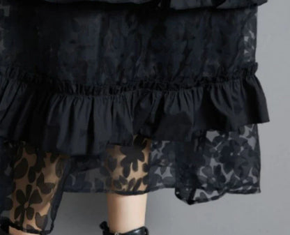 Plus size black lace dress with long sleeves and a loose, relaxed fit for a timeless and sophisticated look