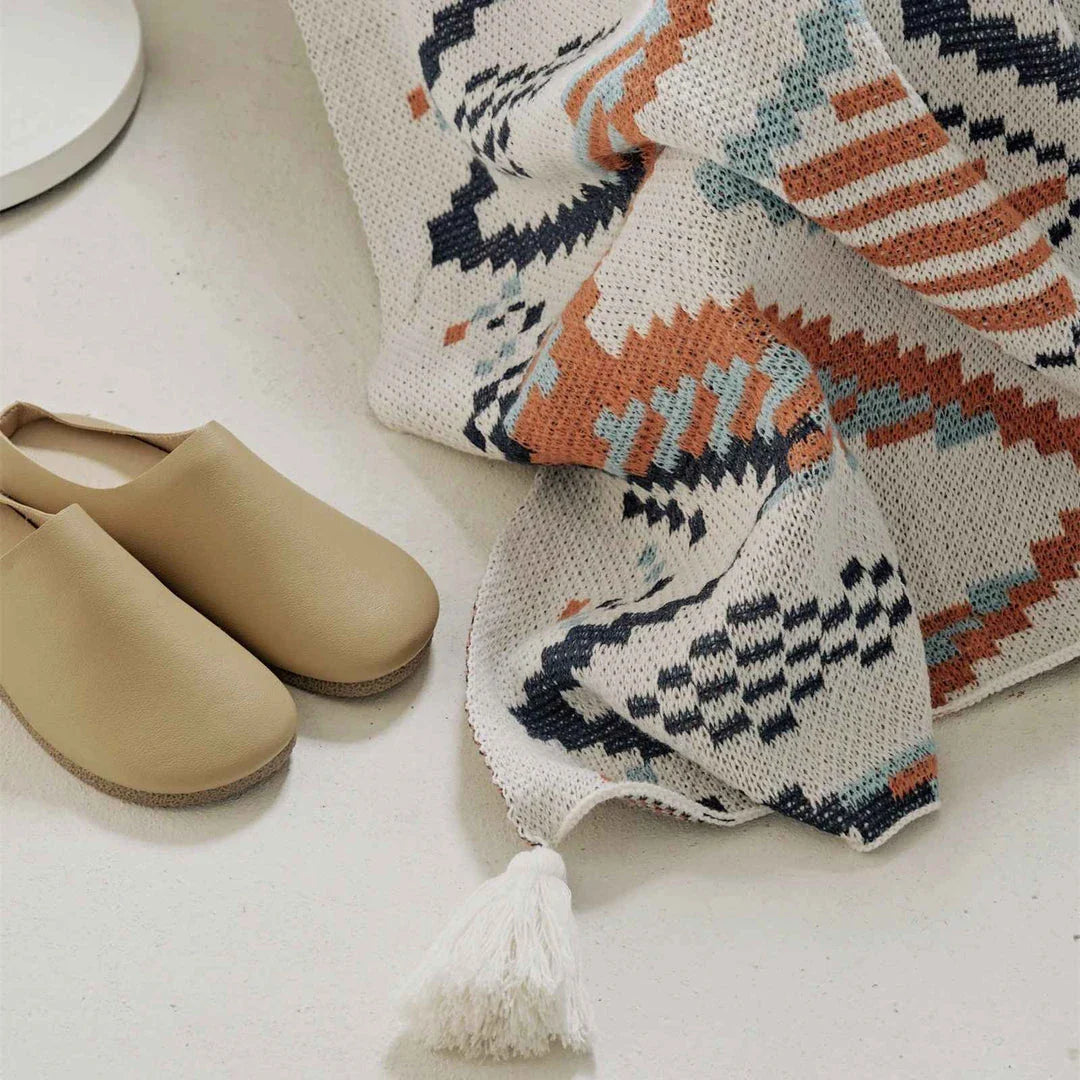 Boho geometric design cotton blanket in various sizes, perfect for indoor and outdoor use