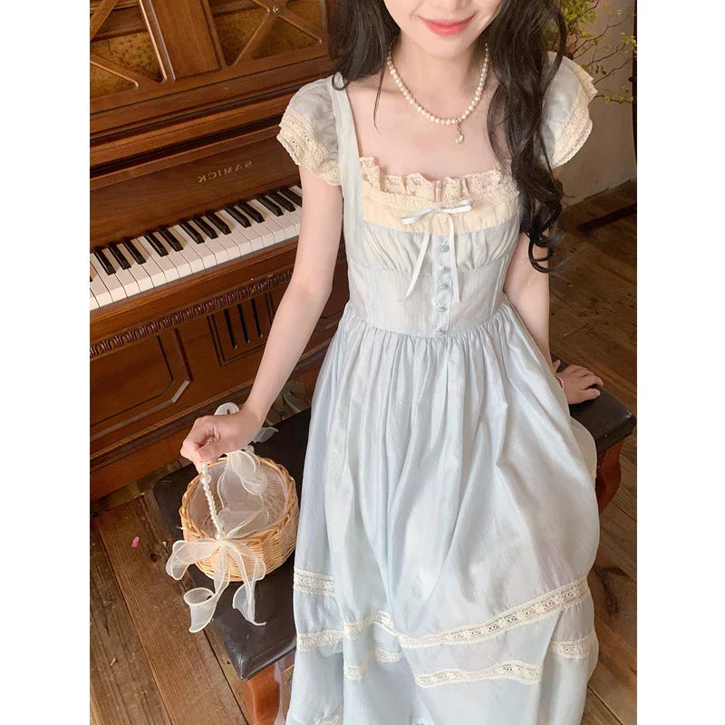 Elegant lace bow blue long dress for stylish ladies, featuring a high-waisted design and sleeveless silhouette for a sophisticated formal look.