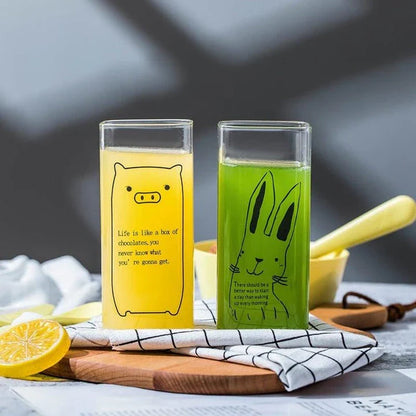 Charming animal-themed glassware with adorable pig, cat, and dog designs, made from durable, eco-friendly glass