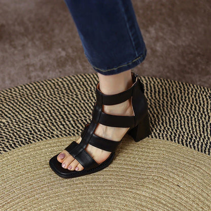 Luxurious leather gladiator sandals with square heel and buckle strap, providing style and comfort for any occasion.