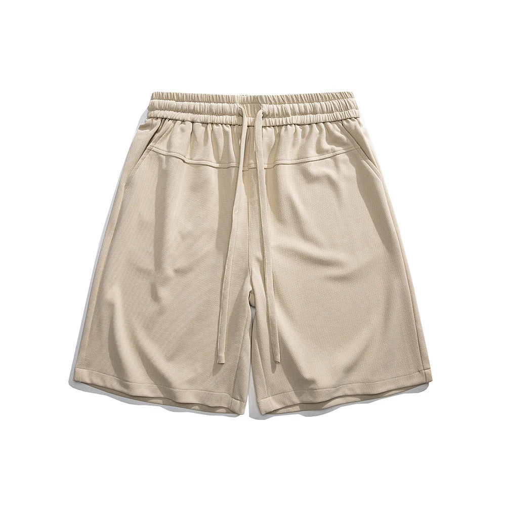 Premium straight-fit drawstring trousers in white, khaki, and black colours for stylish British men