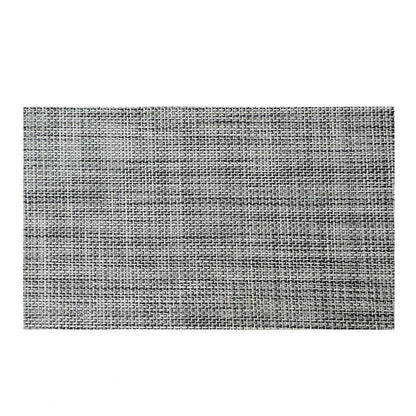 Stylish and durable waterproof placemats in black, protecting a dining table from spills and stains