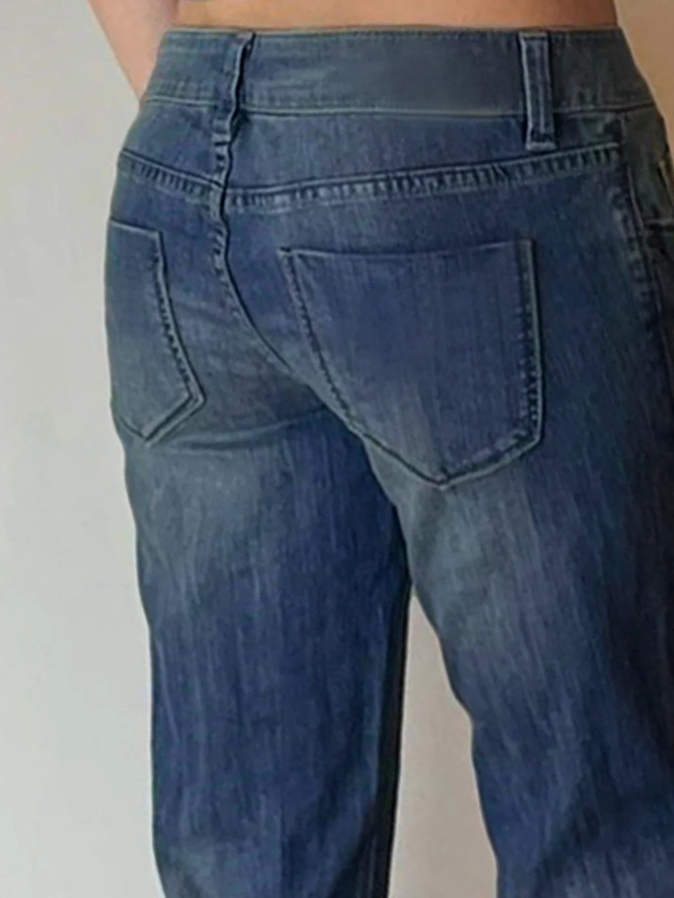 Premium British denim skinny jeans with a tailored fit, stretch fabric, and timeless blue wash