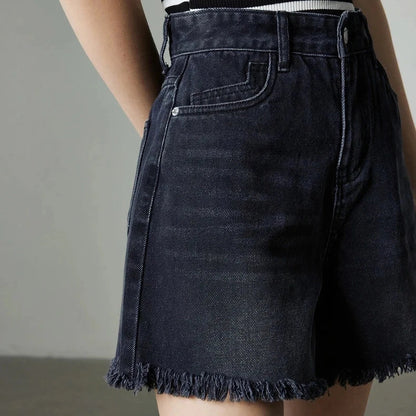 Vintage-inspired high-waisted denim shorts with tassel detailing for women