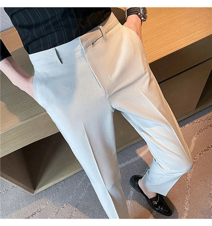 Premium men's suit trousers in a variety of colours, featuring a subtle textured drape and exceptional stretch for all-day comfort and style.