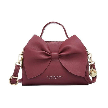 Elegant brown Korean-inspired bow shoulder bag with adjustable strap and roomy interior