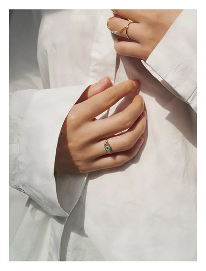 Elegant Lover's Eye Ring made with lustrous mother-of-pearl shell, featuring a delicate and Bohemian-inspired design