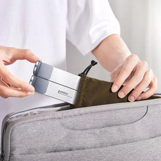 Adjustable and foldable aluminium laptop stand with 5 height levels, cooling design, and skidproof silicone platform