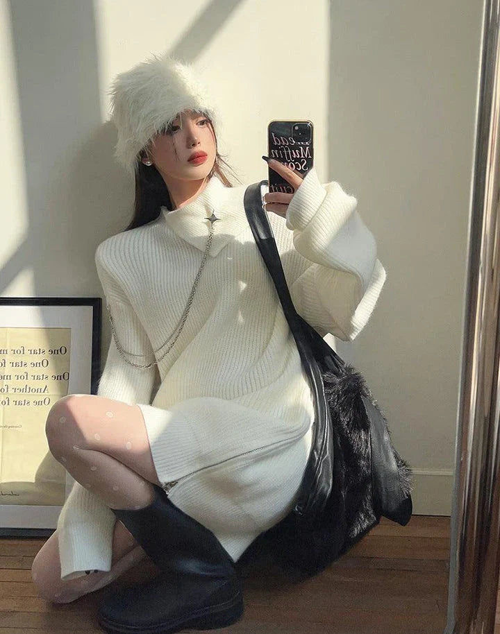 Luxurious off-the-shoulder zipper sweater in black and beige, featuring lantern sleeves and a cozy alpaca wool blend