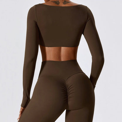 Stylish long sleeve crop top yoga shirt in green, designed for comfort and performance during workouts
