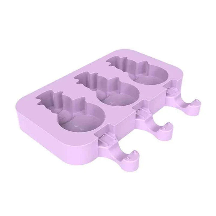 Purple silicone popsicle mould with stainless steel sticks, perfect for creating homemade frozen treats with a British flair
