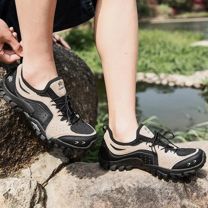 Couple wearing durable British-made mesh hiking shoes exploring the outdoors