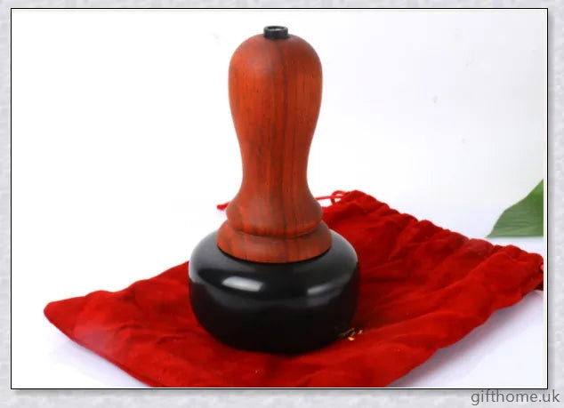 Premium mahogany Bian stone warming moxibustion device with red rosewood accents, designed for traditional Chinese healing practices.