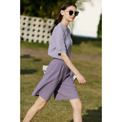 Elegant wide-leg shirred shorts for women, featuring a refined design and comfortable fit for the British summer