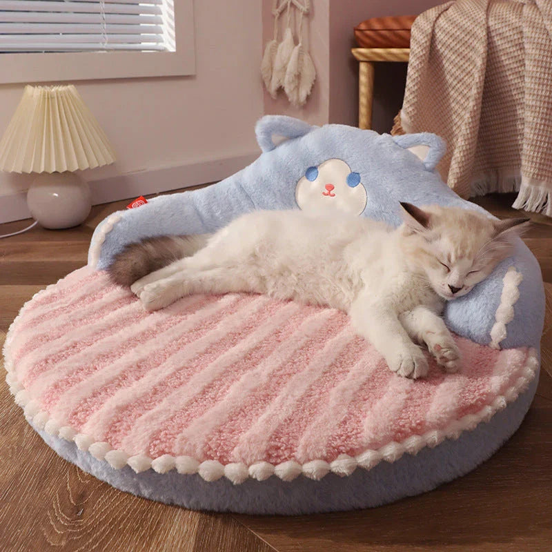 Cosy bear-shaped pet bed in pink colour, designed for cats and small dogs up to 16.5 lbs, with a plush, supportive interior and removable, washable mat.