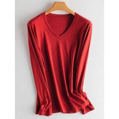 A classic long-sleeved tee in black, made from a premium blend of silk, cotton, and microfiber for a comfortable and elegant look.