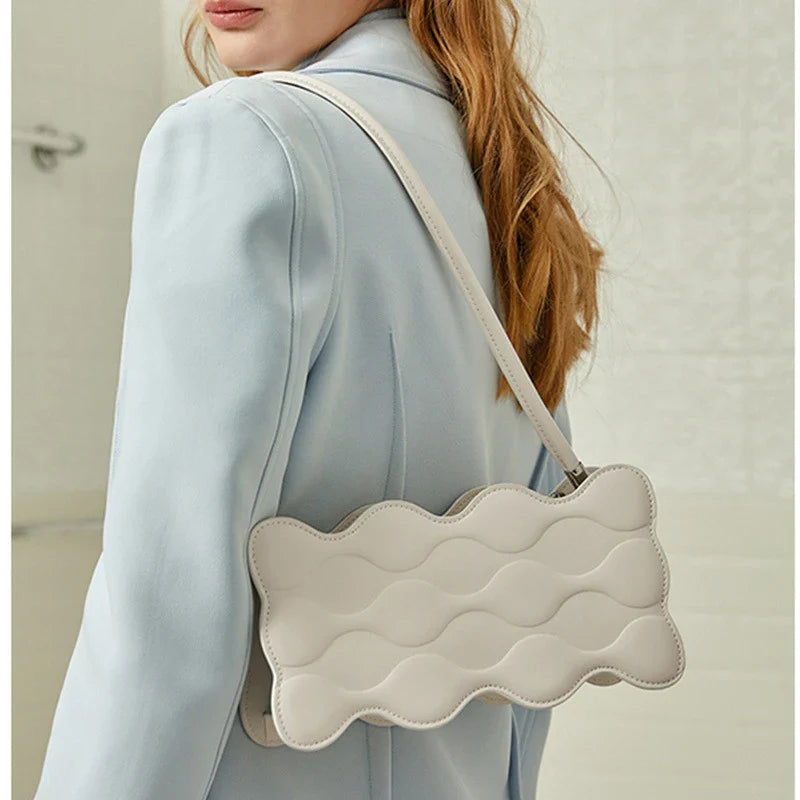 Premium embossed pearl chain handbag in fashionable shades with a soft, comfortable handle for hands-free carrying