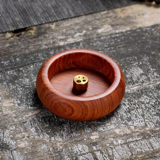 Elegant black sandalwood incense holder with four different caliber sizes to accommodate various incense sticks