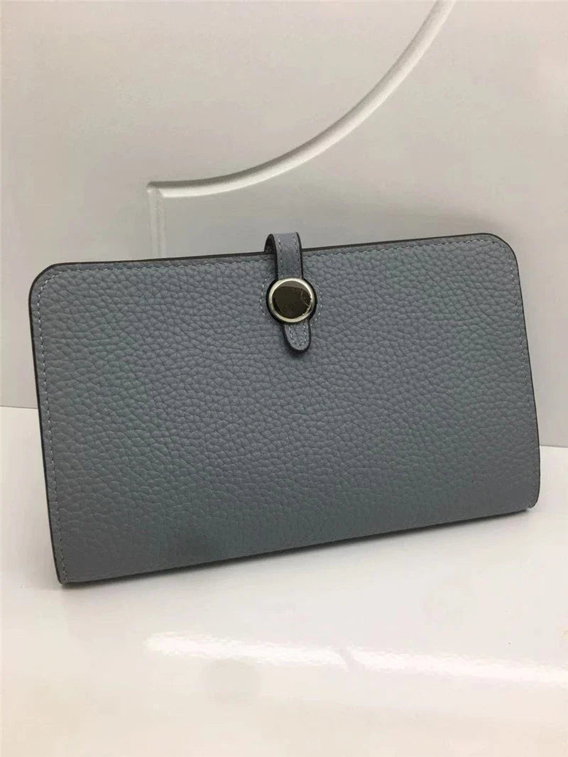 Premium cowhide leather wallet with luxurious lychee pattern design, featuring multiple compartments for secure storage and organisation.