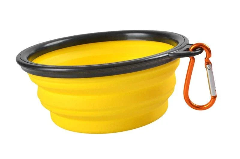 A collapsible pet silicone bowl in black, with a large 350 ml capacity, designed for outdoor adventures with your furry friend.