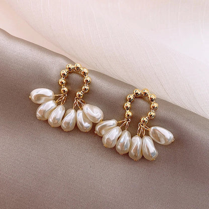 Elegant Baroque pearl earrings with a choice of alloy, silver, or gold plating, a sophisticated accessory that exudes British style and refinement.